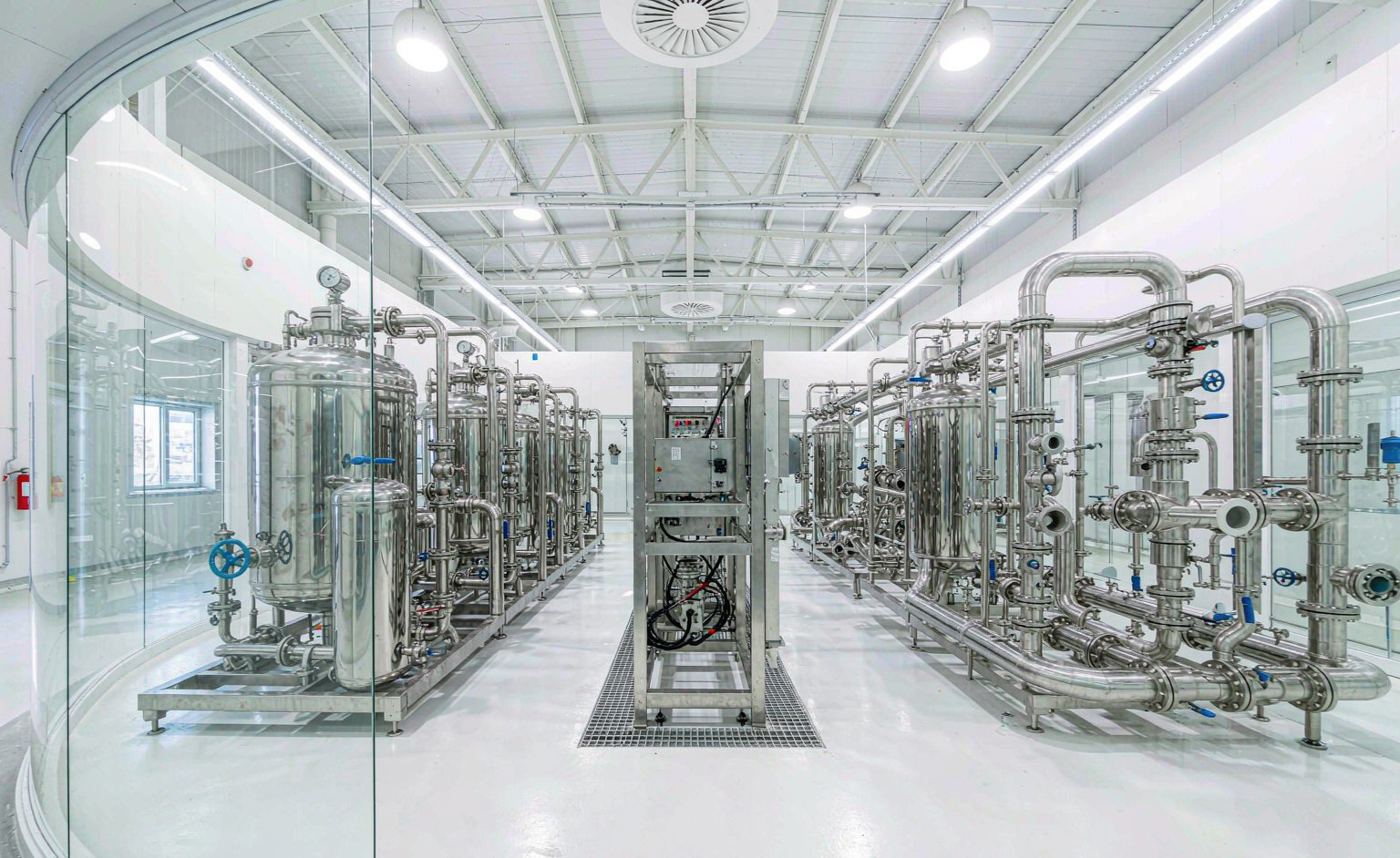 Stainless steel purification vessels inside an Eagle Pure Water facility